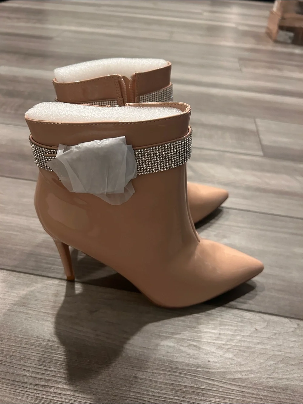 Nude Patent Rhinestone Buckle Ankle Bootie